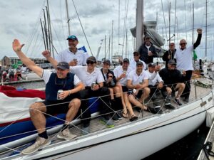 People waving on boat
